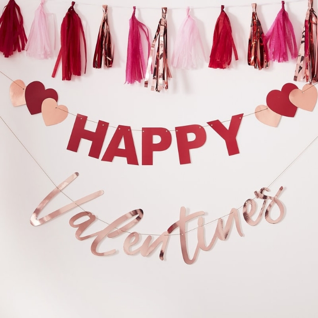 Picture of Rose gold foiled & red "happy valentines" bunting with hearts.