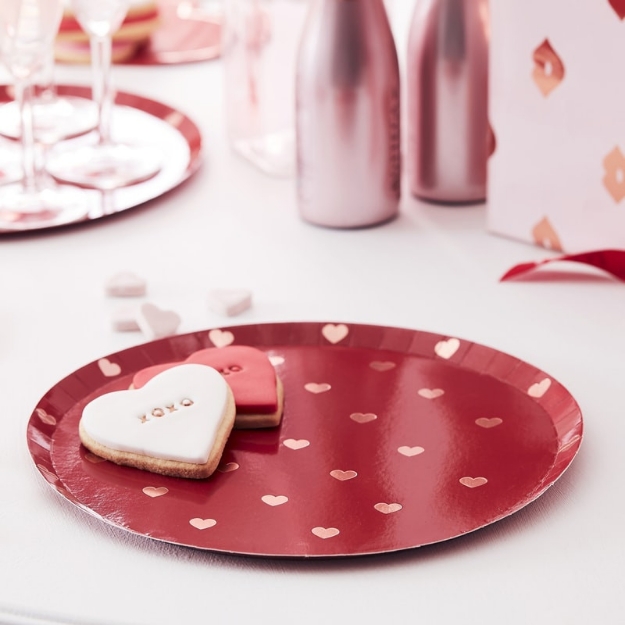 Picture of Red plates with rose gold hearts