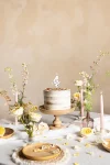 Picture of Candle number 4 white with flower petals