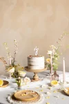 Picture of Candle number 7 white with flower petals